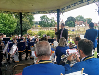 Keith Rowling performing Big Spender accompanied by the band