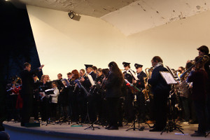 Godalming Band MD James Haigh conducts the massed bands