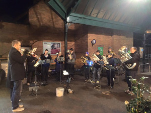 Both bands play carols outside Waitrose to finish off the season