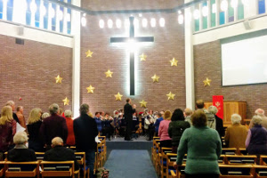 Godalming Band leading carols at Guildford URC