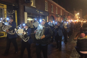 Godalming Band leading the town's torchlight procession