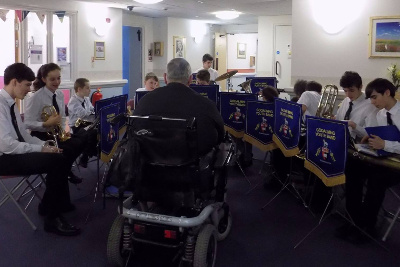 Youth Band visiting the residents at Eastlake Residential Home with some carols