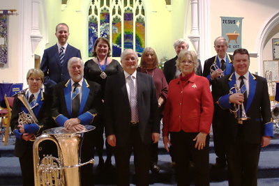 With local county and town councillors in thanks for their donations towards the uniforms, with band committee members