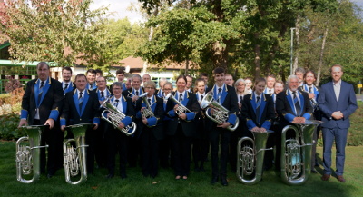 Godalming Band pictured outside The Hawth after playing in the B section